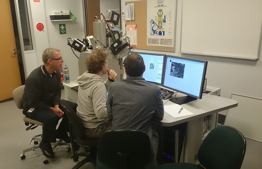 CSIRO scientists performing automated mineralogical analyses using the recently installed TESCAN TIMA automated mineralogy system.